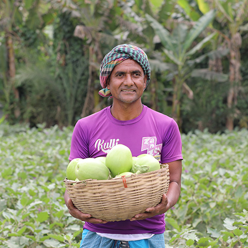 Man holding eggplant